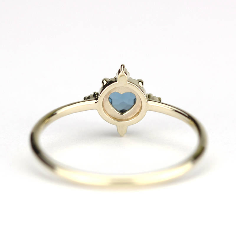 simple engagement ring compass shape ring London blue topaz and diamonds - NOOI JEWELRY