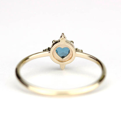 simple engagement ring compass shape ring London blue topaz and diamonds - NOOI JEWELRY