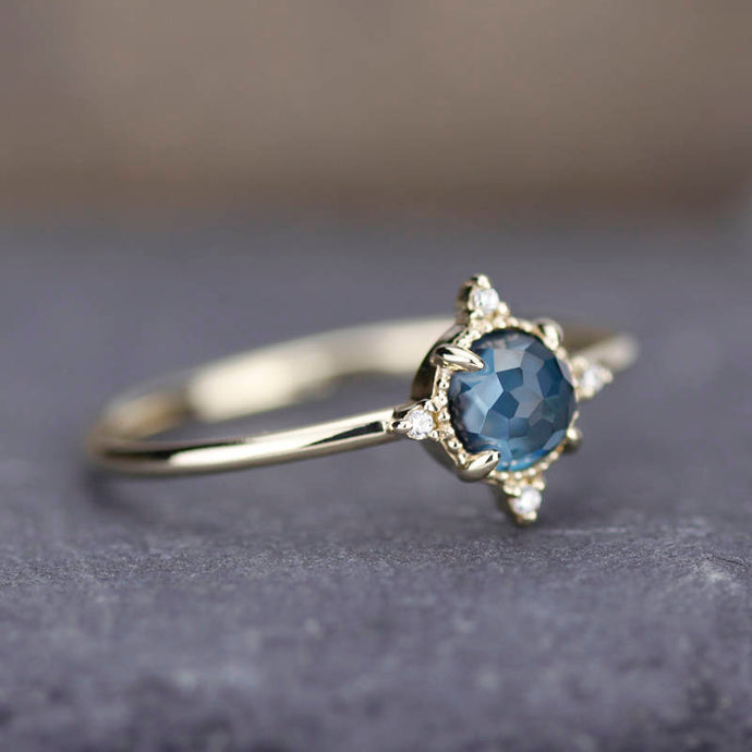 simple engagement ring compass shape ring London blue topaz and diamonds - NOOI JEWELRY