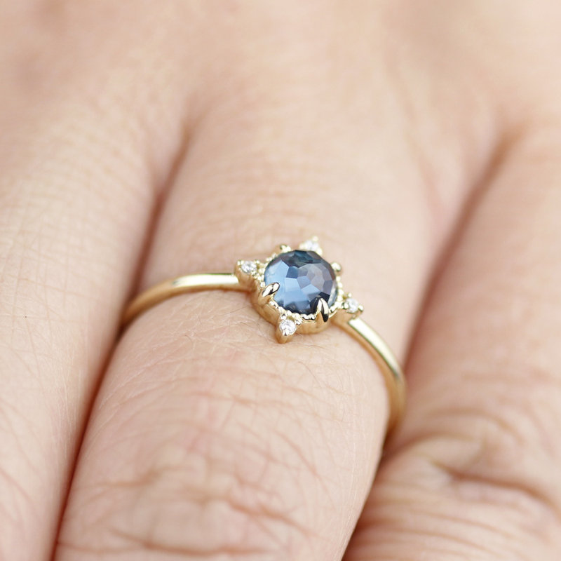 simple engagement ring compass shape ring London blue topaz and diamonds - NOOI JEWELRY