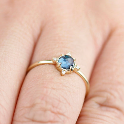 simple engagement ring compass shape ring London blue topaz and diamonds - NOOI JEWELRY