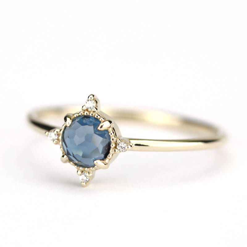 simple engagement ring compass shape ring London blue topaz and diamonds - NOOI JEWELRY
