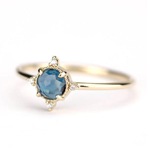 simple engagement ring compass shape ring London blue topaz and diamonds - NOOI JEWELRY
