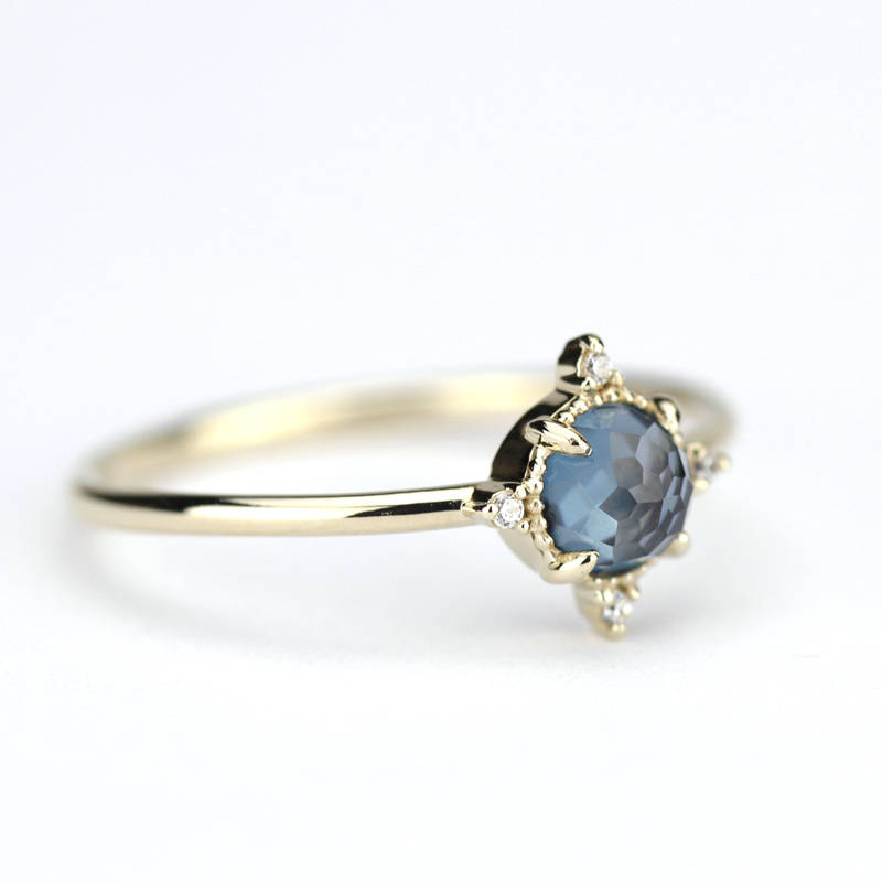 simple engagement ring compass shape ring London blue topaz and diamonds - NOOI JEWELRY
