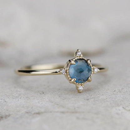 simple engagement ring compass shape ring London blue topaz and diamonds - NOOI JEWELRY