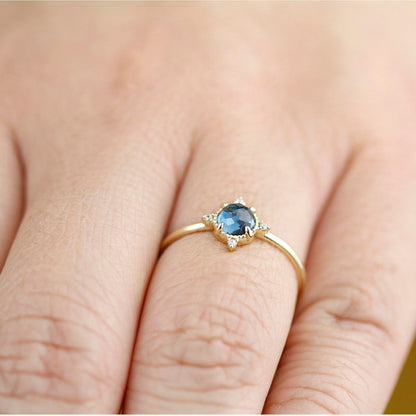 simple engagement ring compass shape ring London blue topaz and diamonds - NOOI JEWELRY