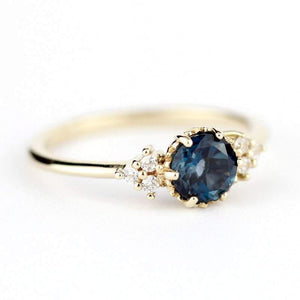 Delicate cluster engagement ring London Blue Topaz and diamonds - NOOI JEWELRY
