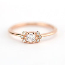 Load image into Gallery viewer, Round engagement ring with side stones rose gold - NOOI JEWELRY