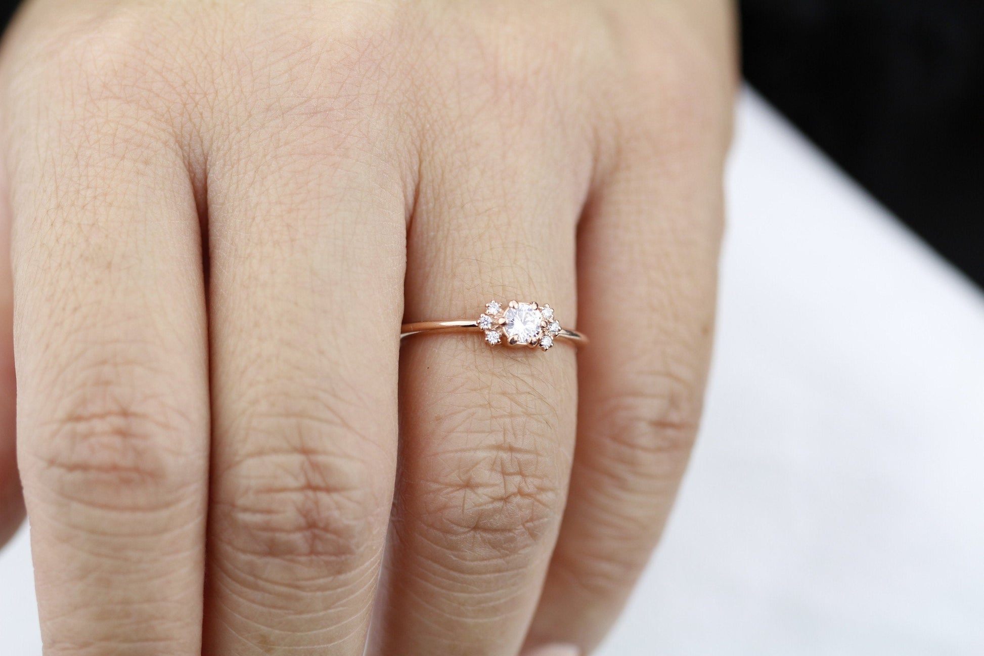 Round engagement ring with side stones rose gold - NOOI JEWELRY