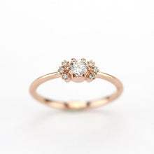 Load image into Gallery viewer, Round engagement ring with side stones rose gold - NOOI JEWELRY