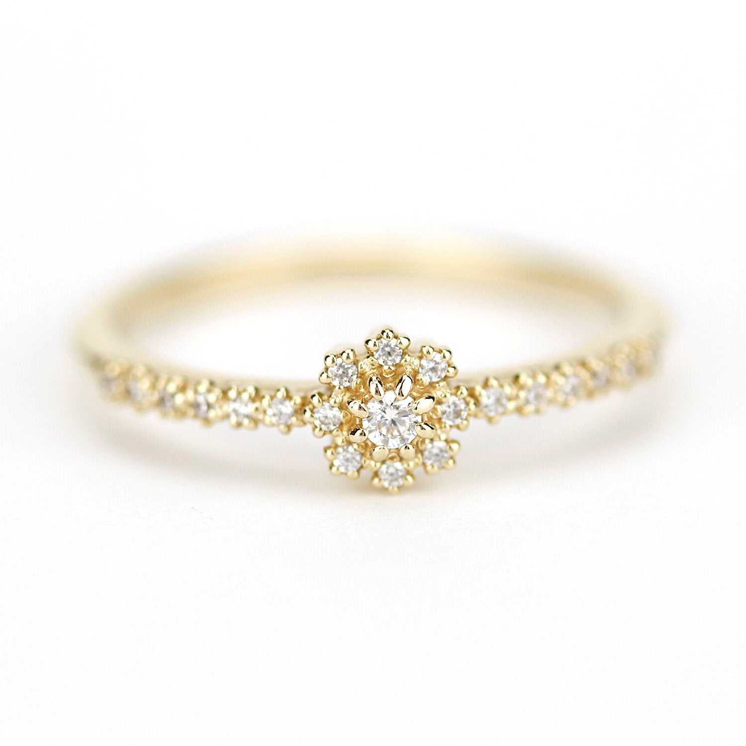 Halo engagement ring with side stones - NOOI JEWELRY