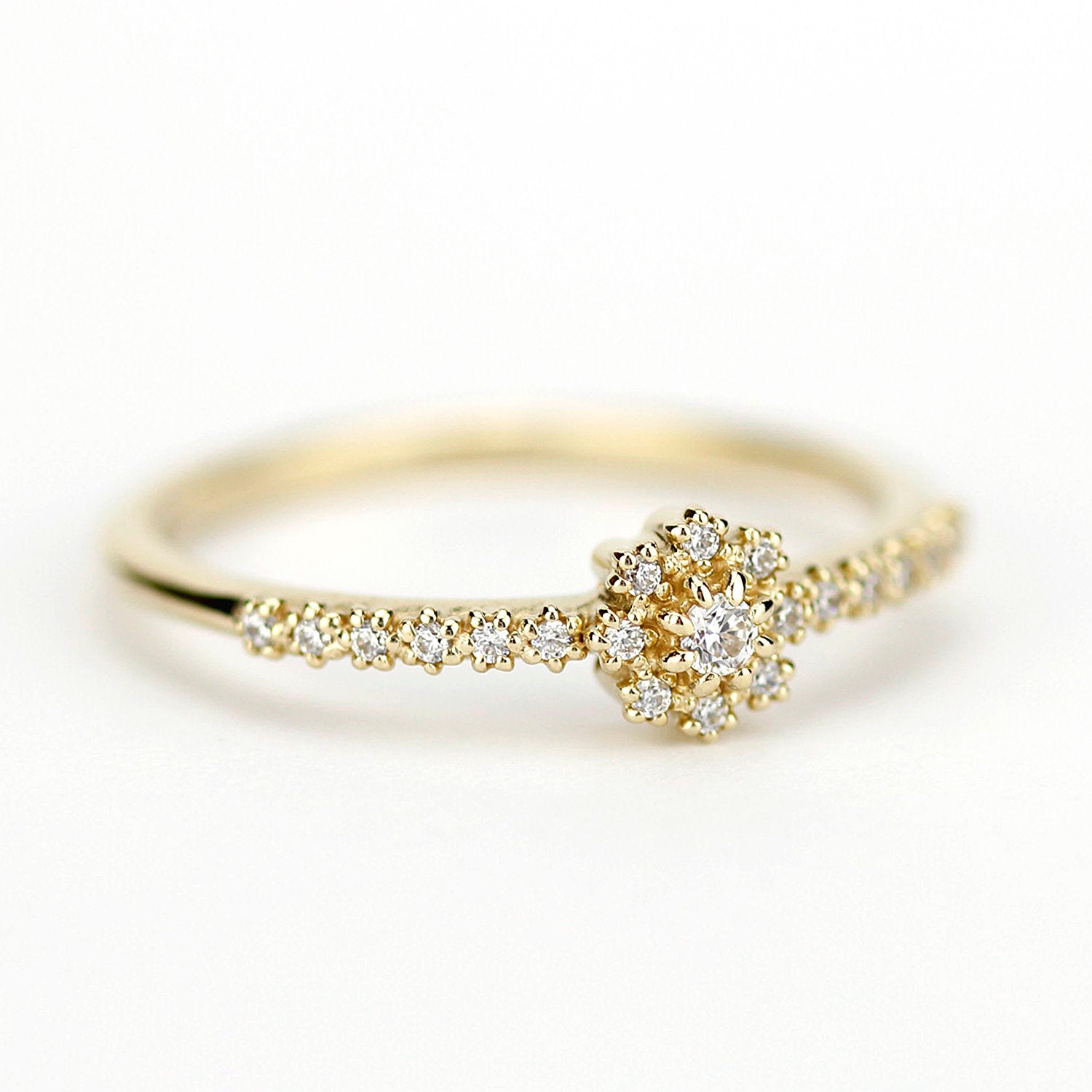 Halo engagement ring with side stones - NOOI JEWELRY