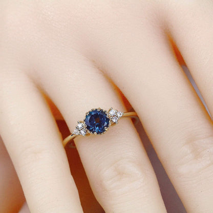Delicate cluster engagement ring London Blue Topaz and diamonds - NOOI JEWELRY