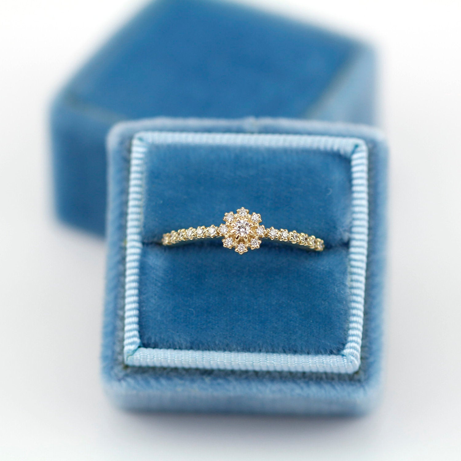 Halo engagement ring with side stones - NOOI JEWELRY