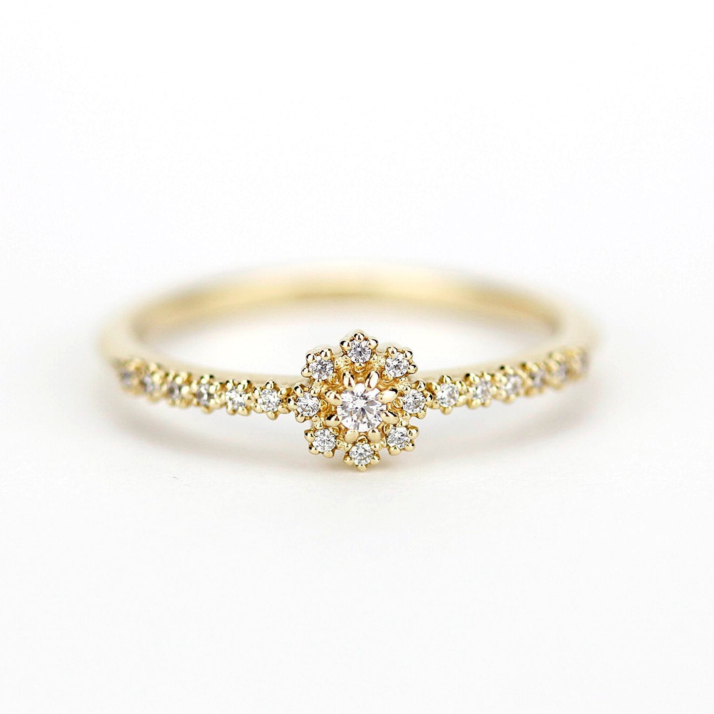Halo engagement ring with side stones - NOOI JEWELRY