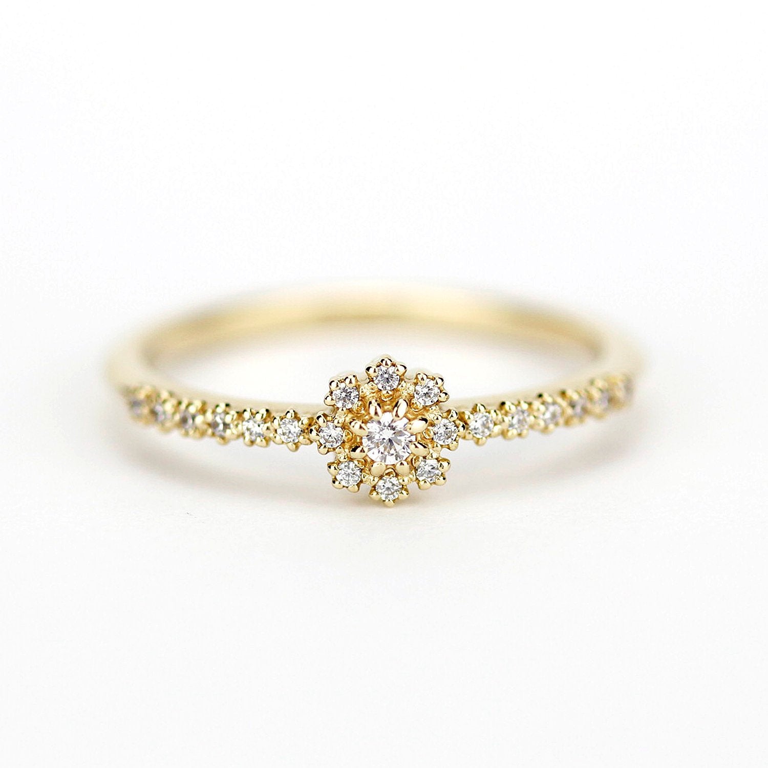 Halo engagement ring with side stones - NOOI JEWELRY