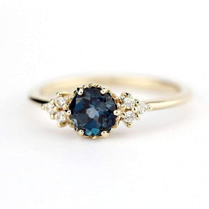 Delicate cluster engagement ring London Blue Topaz and diamonds - NOOI JEWELRY