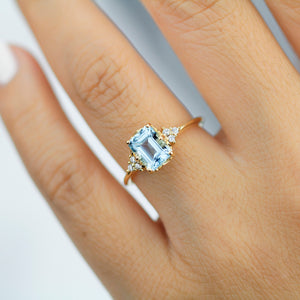 Sky blue topaz 8x6 mm emerald cut with diamonds on the side - NOOI JEWELRY