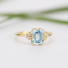 Load image into Gallery viewer, Sky blue topaz 8x6 mm emerald cut with diamonds on the side - NOOI JEWELRY