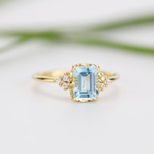Sky blue topaz 8x6 mm emerald cut with diamonds on the side - NOOI JEWELRY