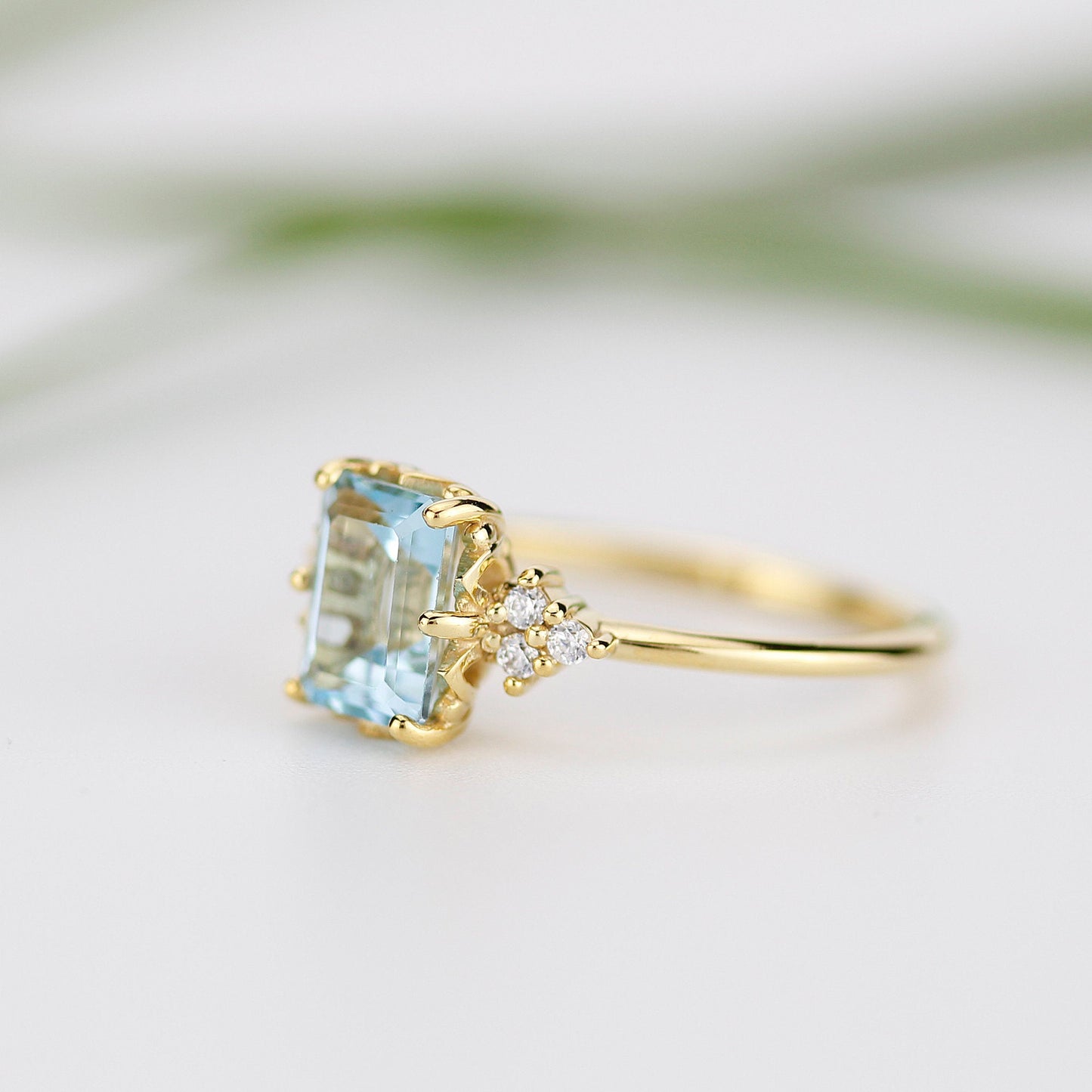 Sky blue topaz 8x6 mm emerald cut with diamonds on the side - NOOI JEWELRY