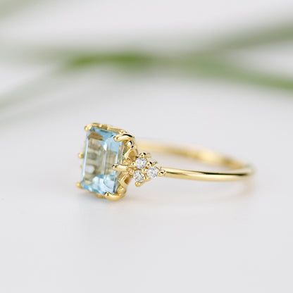 Sky blue topaz 8x6 mm emerald cut with diamonds on the side - NOOI JEWELRY