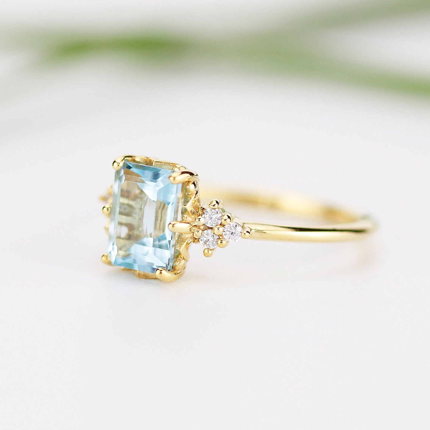 Sky blue topaz 8x6 mm emerald cut with diamonds on the side - NOOI JEWELRY