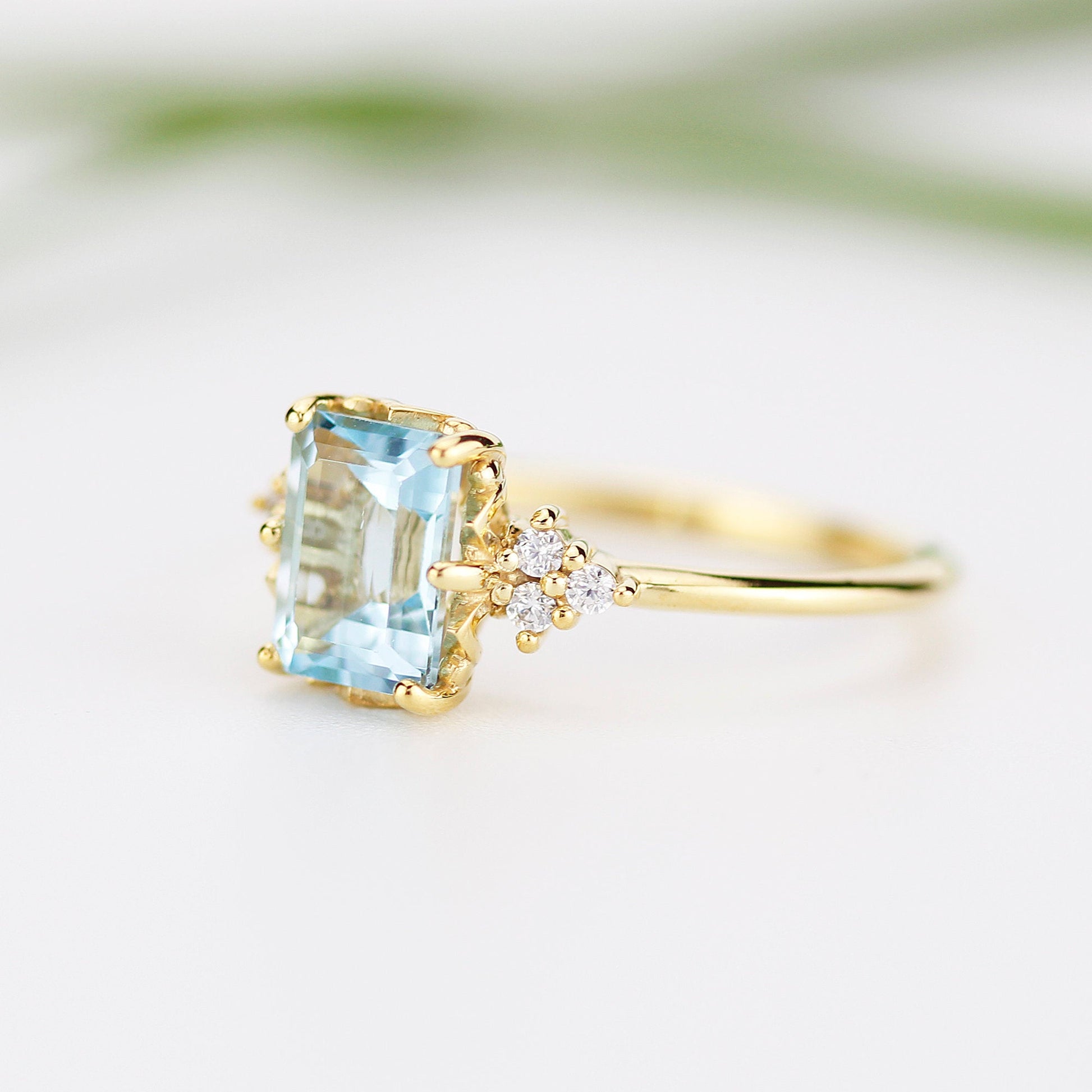 Sky blue topaz 8x6 mm emerald cut with diamonds on the side - NOOI JEWELRY