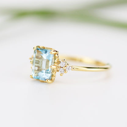 Sky blue topaz 8x6 mm emerald cut with diamonds on the side - NOOI JEWELRY