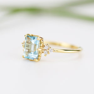 Sky blue topaz 8x6 mm emerald cut with diamonds on the side - NOOI JEWELRY