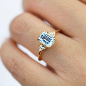 Sky blue topaz 8x6 mm emerald cut with diamonds on the side - NOOI JEWELRY