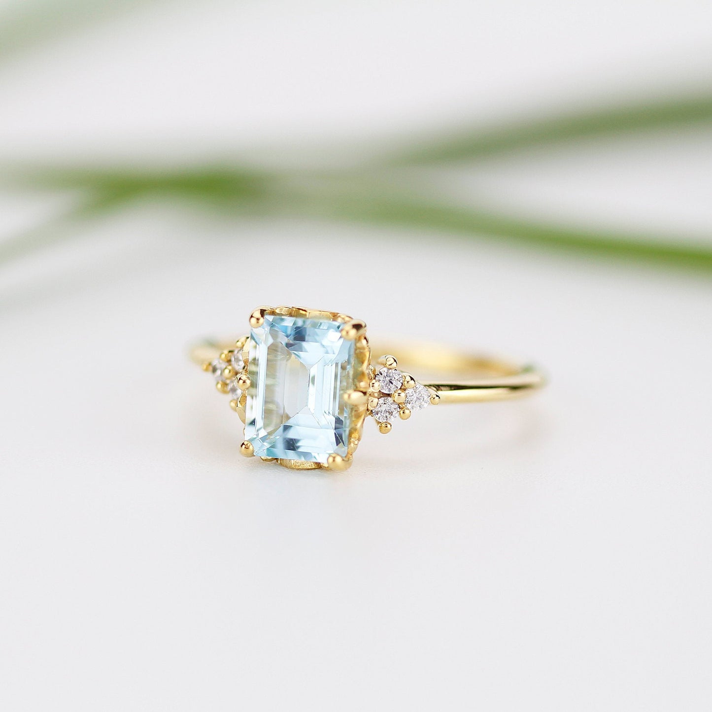 Sky blue topaz 8x6 mm emerald cut with diamonds on the side - NOOI JEWELRY