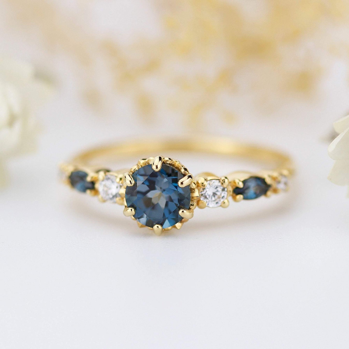 Cluster engagement ring round London blue topaz with marquise stone on the side - NOOI JEWELRY