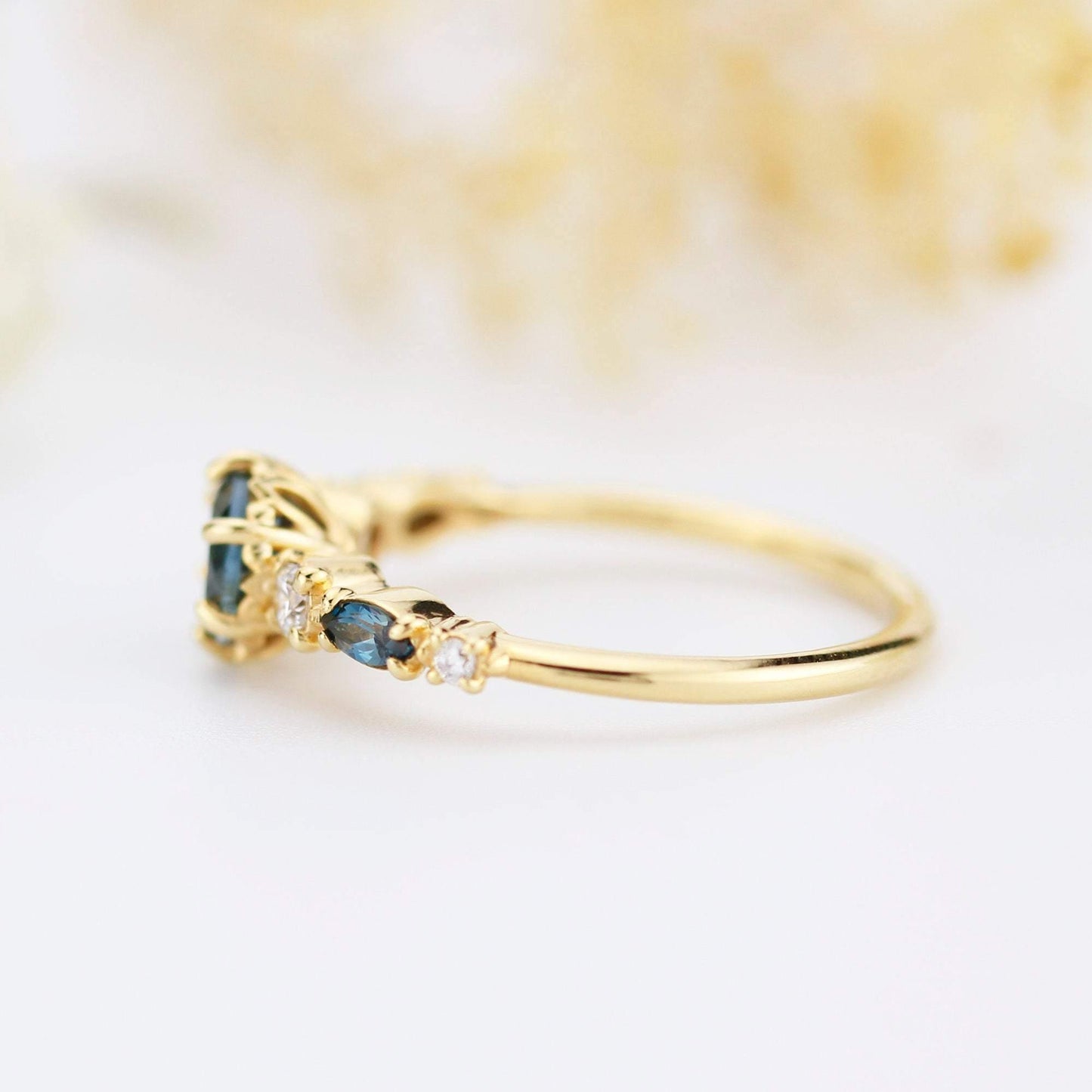 Cluster engagement ring round London blue topaz with marquise stone on the side - NOOI JEWELRY