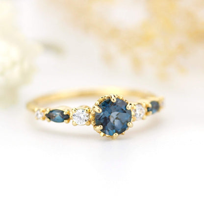 Cluster engagement ring round London blue topaz with marquise stone on the side - NOOI JEWELRY