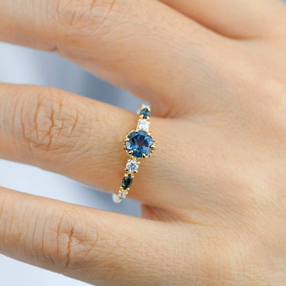 Cluster engagement ring round London blue topaz with marquise stone on the side - NOOI JEWELRY