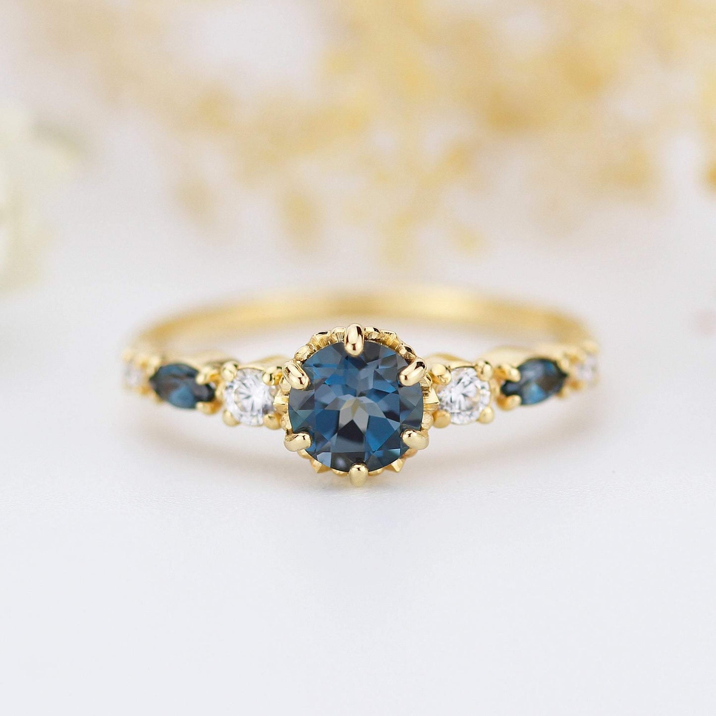 Cluster engagement ring round London blue topaz with marquise stone on the side - NOOI JEWELRY