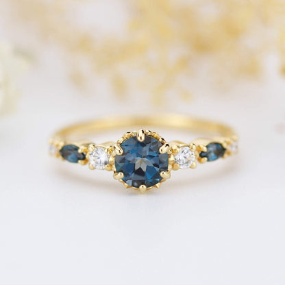 Cluster engagement ring round London blue topaz with marquise stone on the side - NOOI JEWELRY