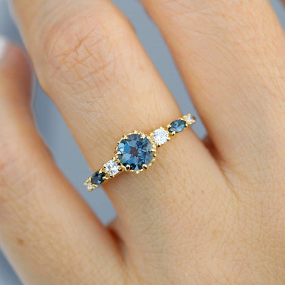 Cluster engagement ring round London blue topaz with marquise stone on the side - NOOI JEWELRY