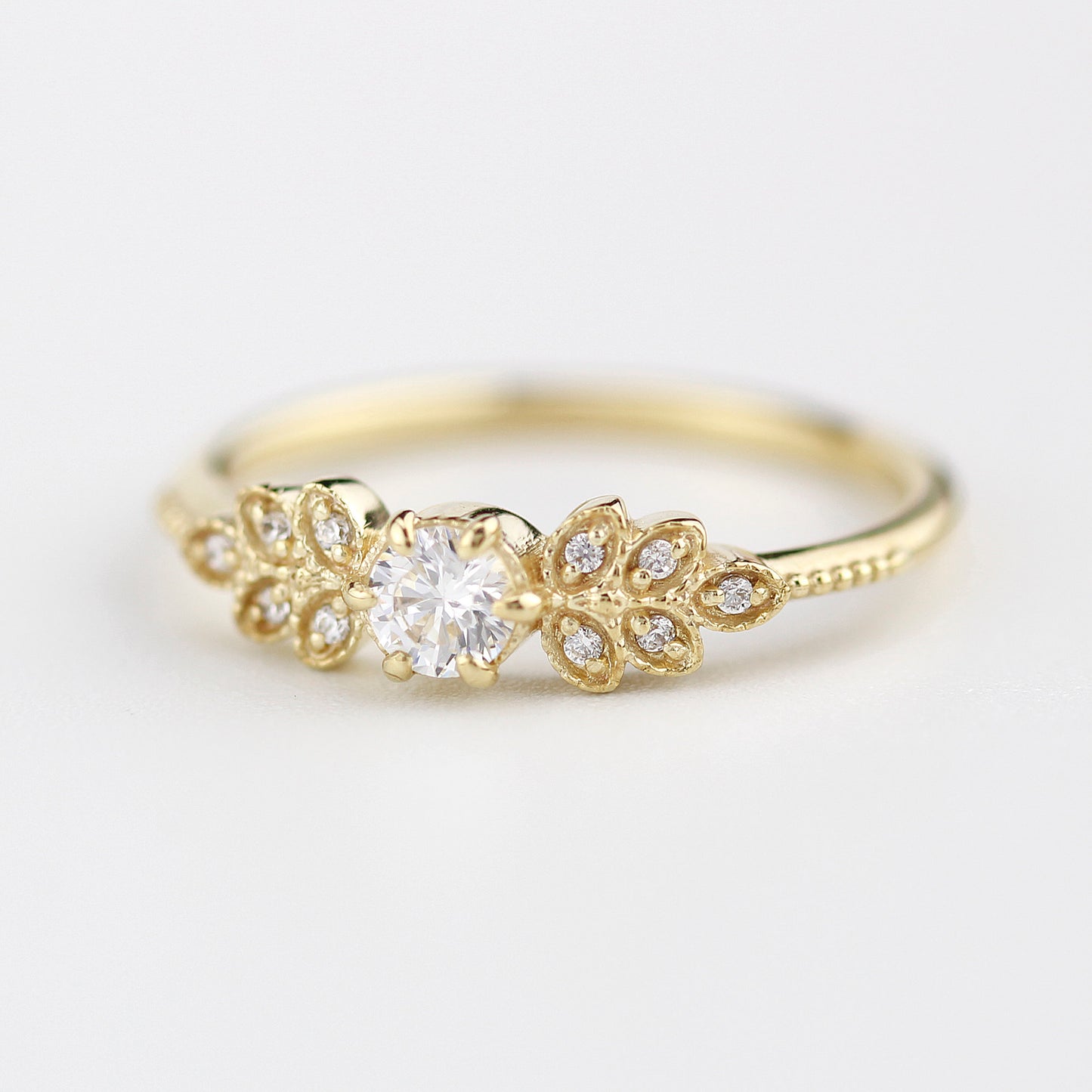 Marquise engagement ring vintage art deco diamond | round diamond with marquise side stones - NOOI JEWELRY