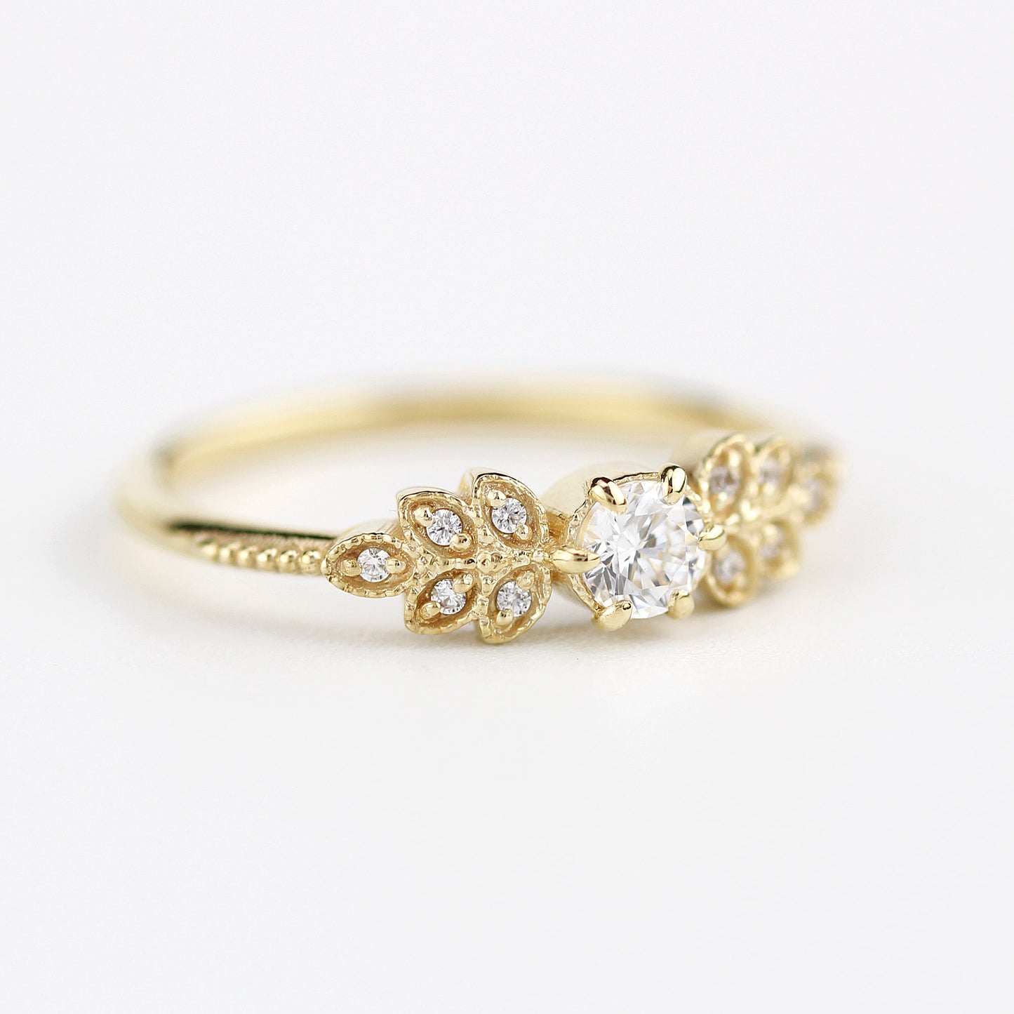 Marquise engagement ring vintage art deco diamond | round diamond with marquise side stones - NOOI JEWELRY