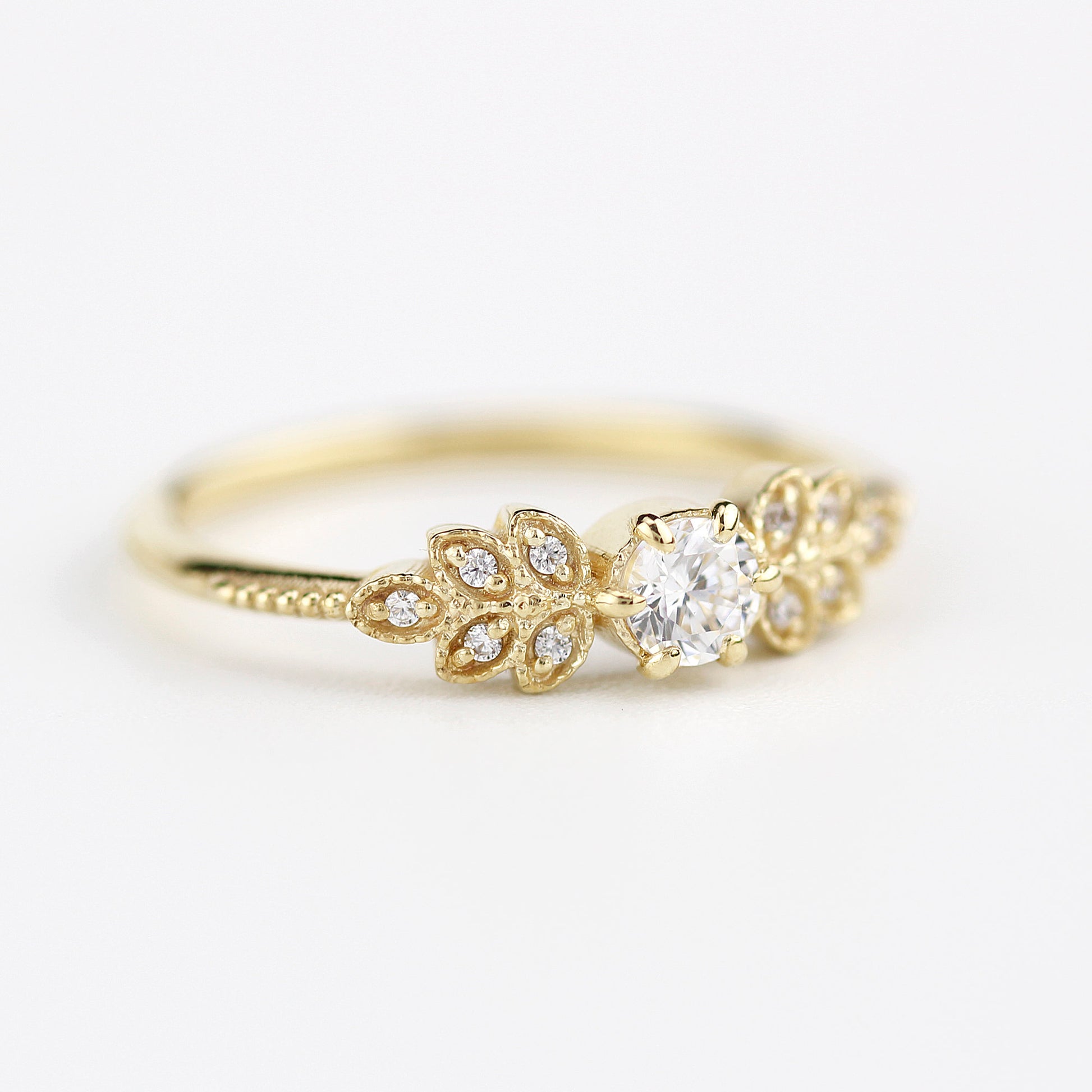 Marquise engagement ring vintage art deco diamond | round diamond with marquise side stones - NOOI JEWELRY