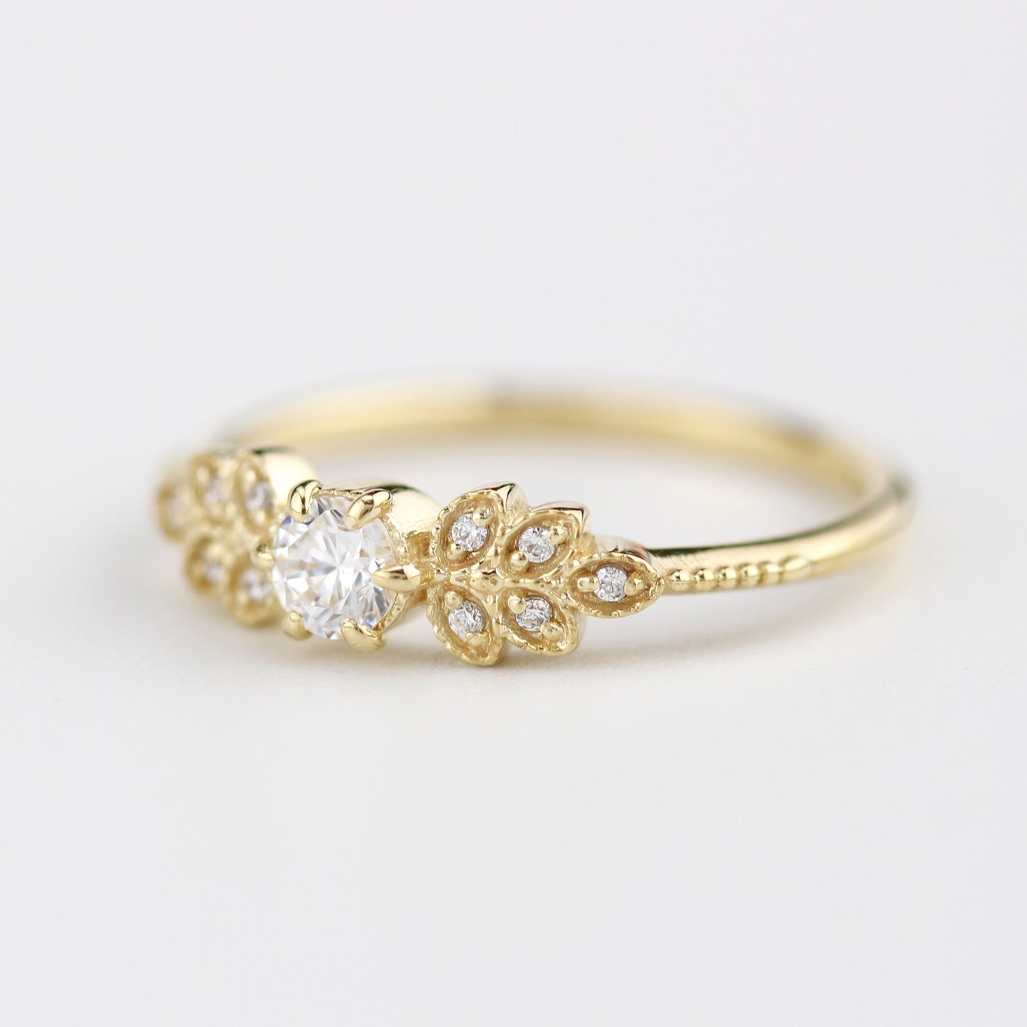 Marquise engagement ring vintage art deco diamond | round diamond with marquise side stones - NOOI JEWELRY
