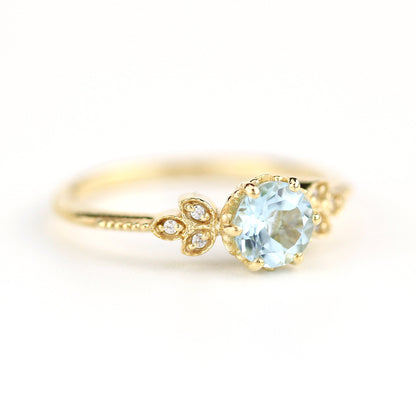 Sky blue topaz engagement ring vintage, marquise diamond setting on the side - NOOI JEWELRY
