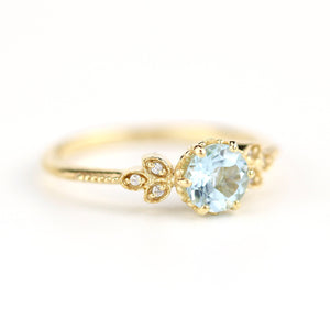 Sky blue topaz engagement ring vintage, marquise diamond setting on the side - NOOI JEWELRY