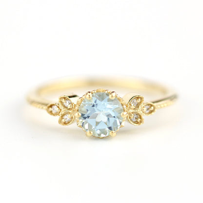 Sky blue topaz engagement ring vintage, marquise diamond setting on the side - NOOI JEWELRY