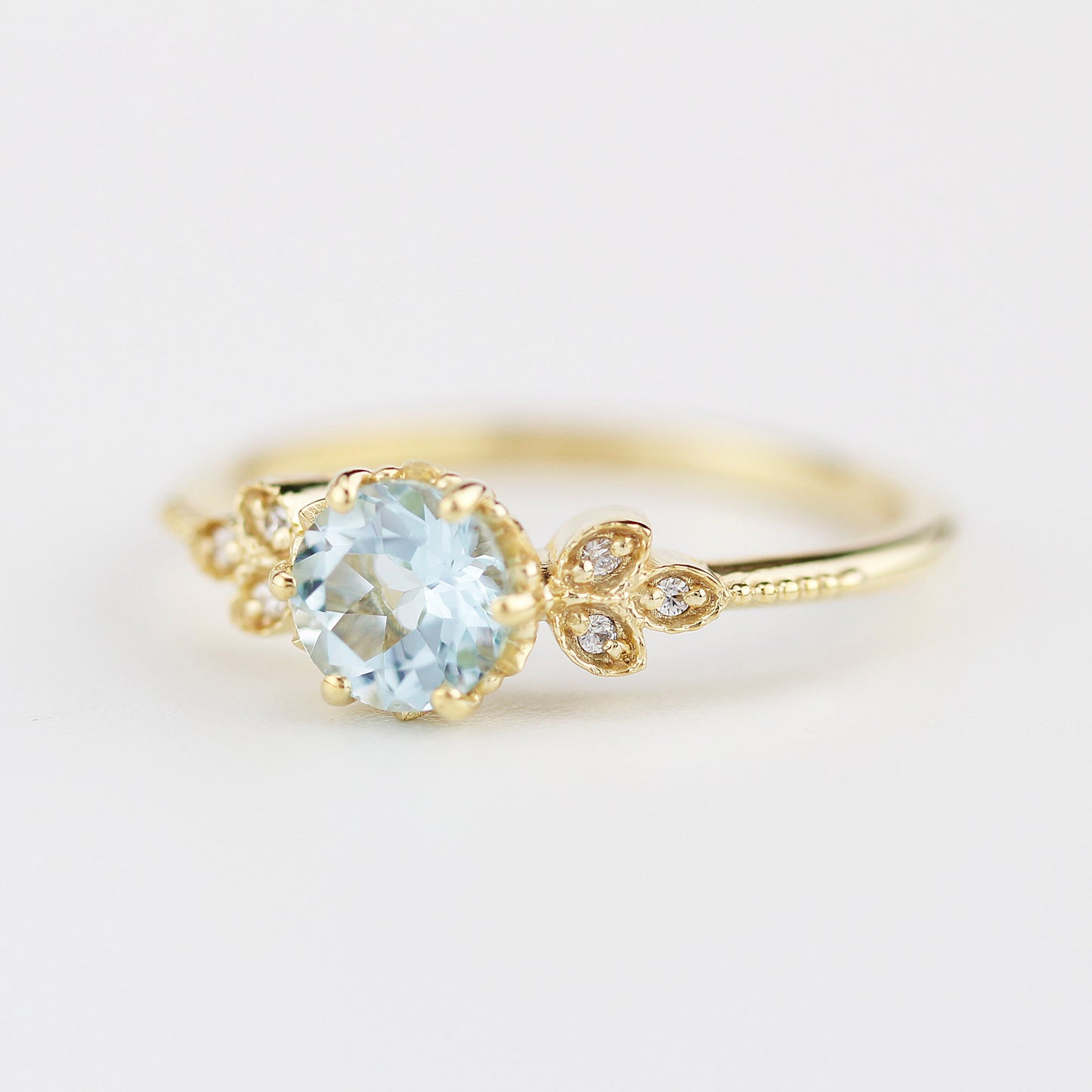 Sky blue topaz engagement ring vintage, marquise diamond setting on the side - NOOI JEWELRY