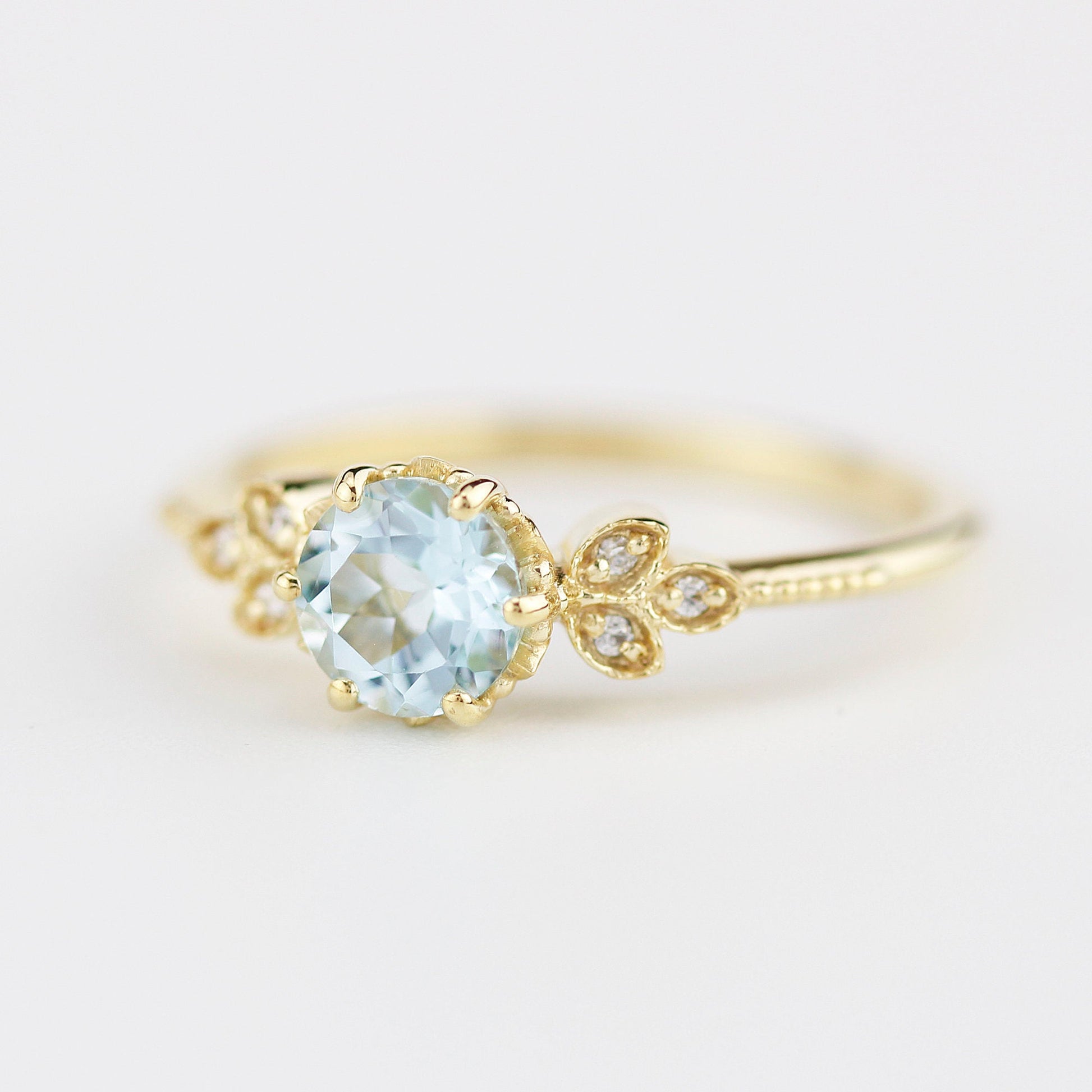 Sky blue topaz engagement ring vintage, marquise diamond setting on the side - NOOI JEWELRY