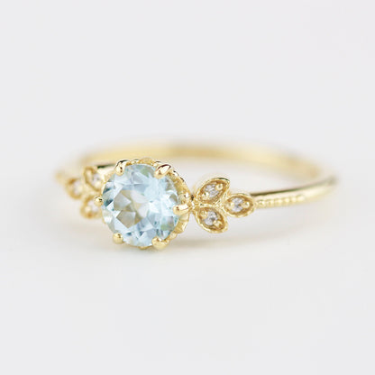 Sky blue topaz engagement ring vintage, marquise diamond setting on the side - NOOI JEWELRY