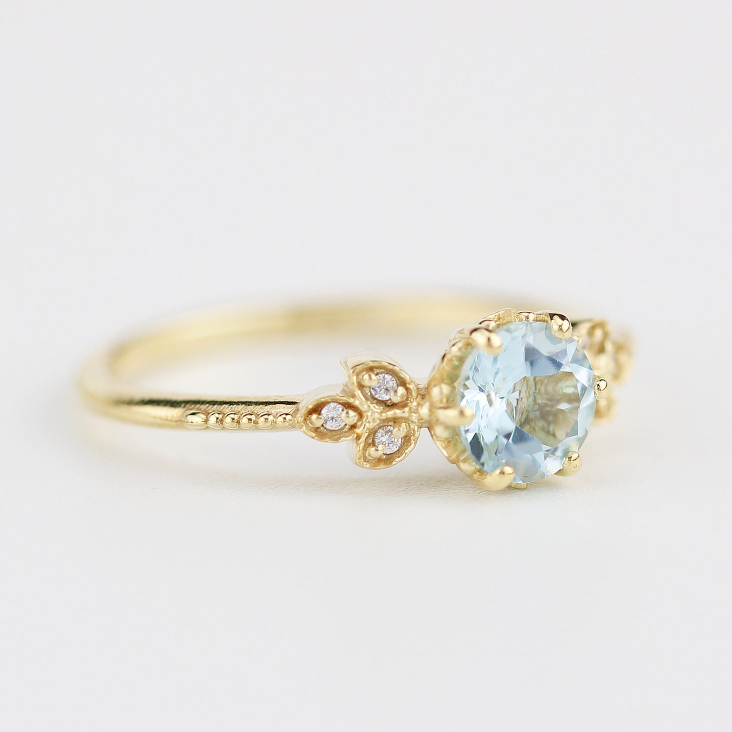 Sky blue topaz engagement ring vintage, marquise diamond setting on the side - NOOI JEWELRY